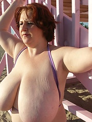 Big titted Sapphires 36HH in tight bikini