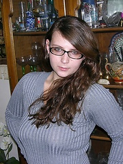 Brunette Woman Wearing Glasses Models Nude