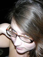 Brunette Woman Wearing Glasses Models Nude